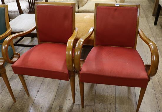 A pair of stylish 1940s French elbow chairs